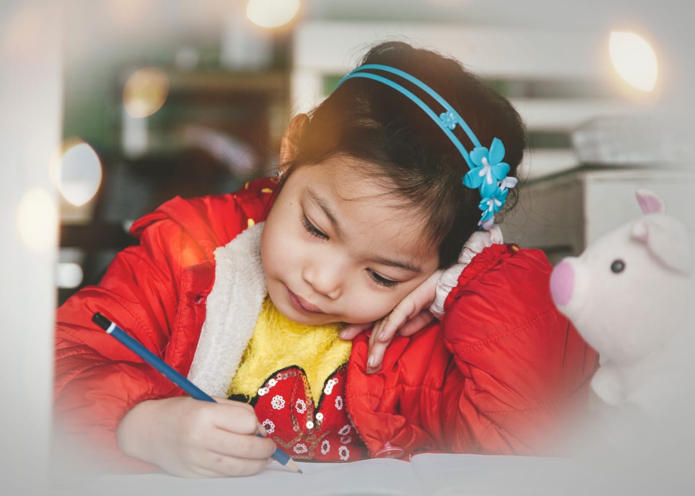 how to explain COVID-19 to kids girl writing letter to patient